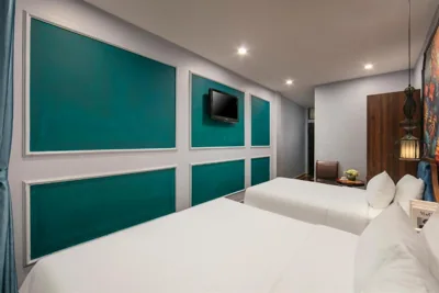 Deluxe driepersoonskamer — Elegance Premium Hotel